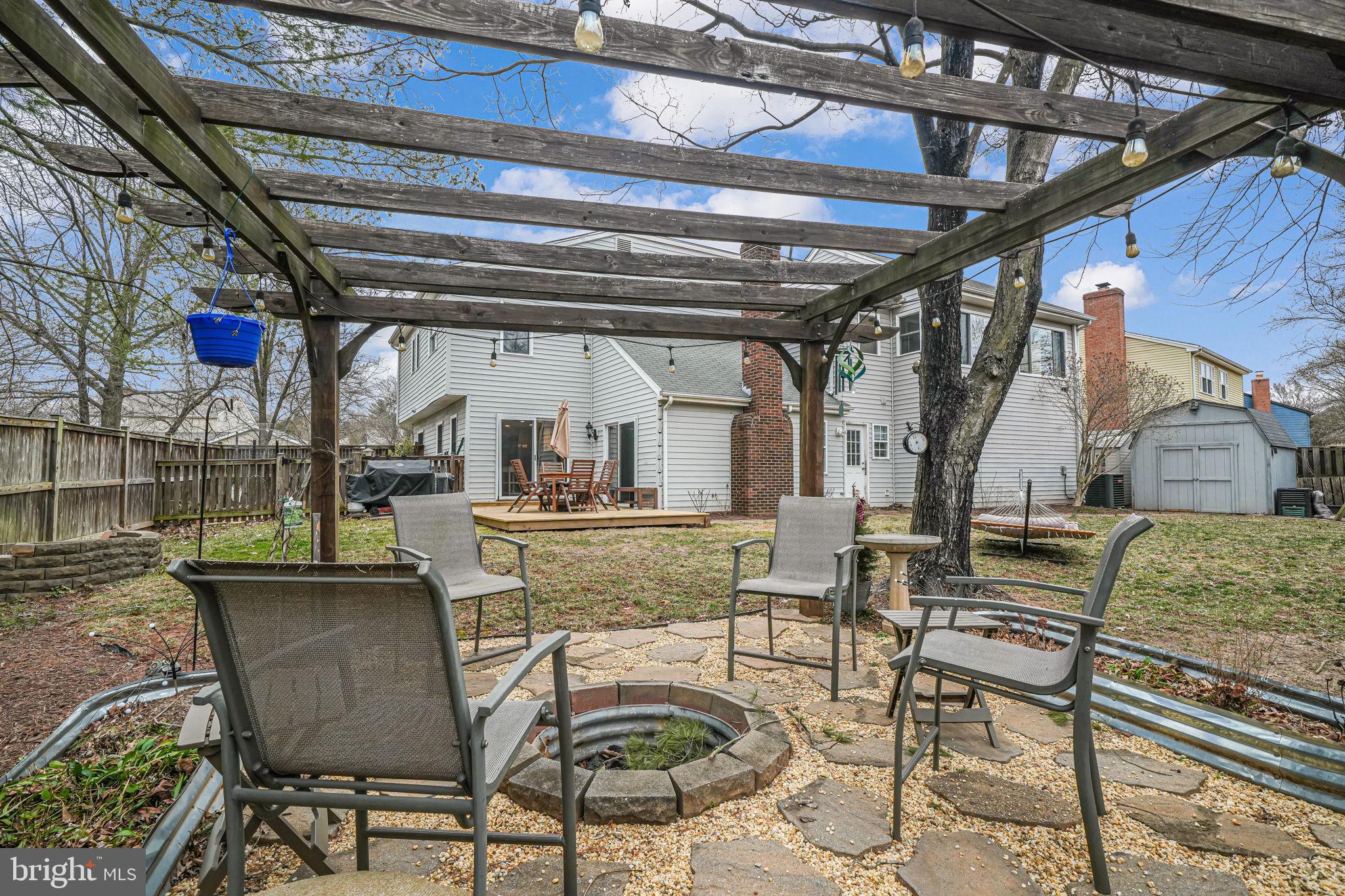 116 Elm Tree Lane Sterling, VA 20164 - Photo 51 of 56 Pergola and firepit