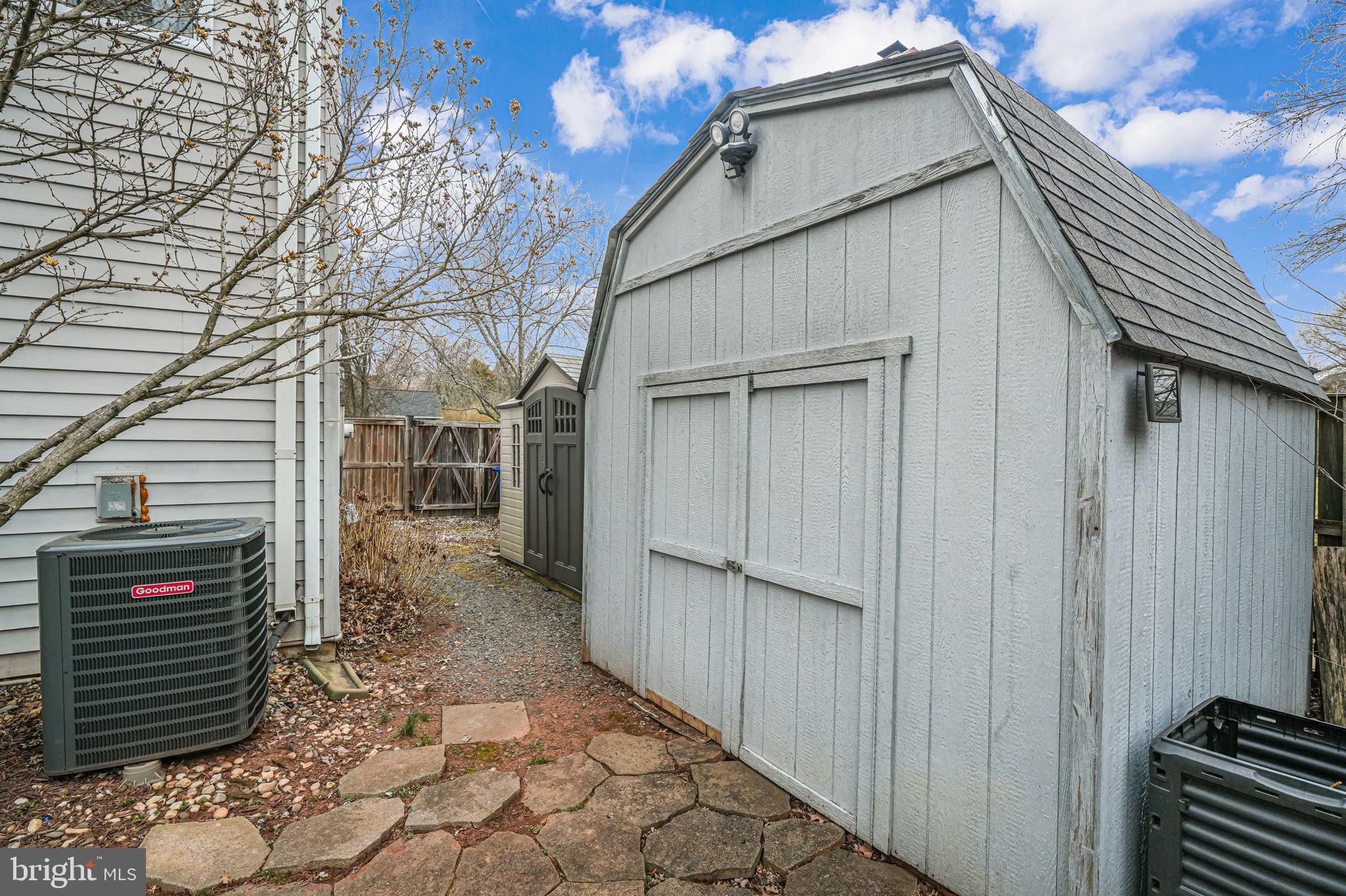 116 Elm Tree Lane Sterling, VA 20164 - Photo 54 of 56 Paving stones leading from deck to shed