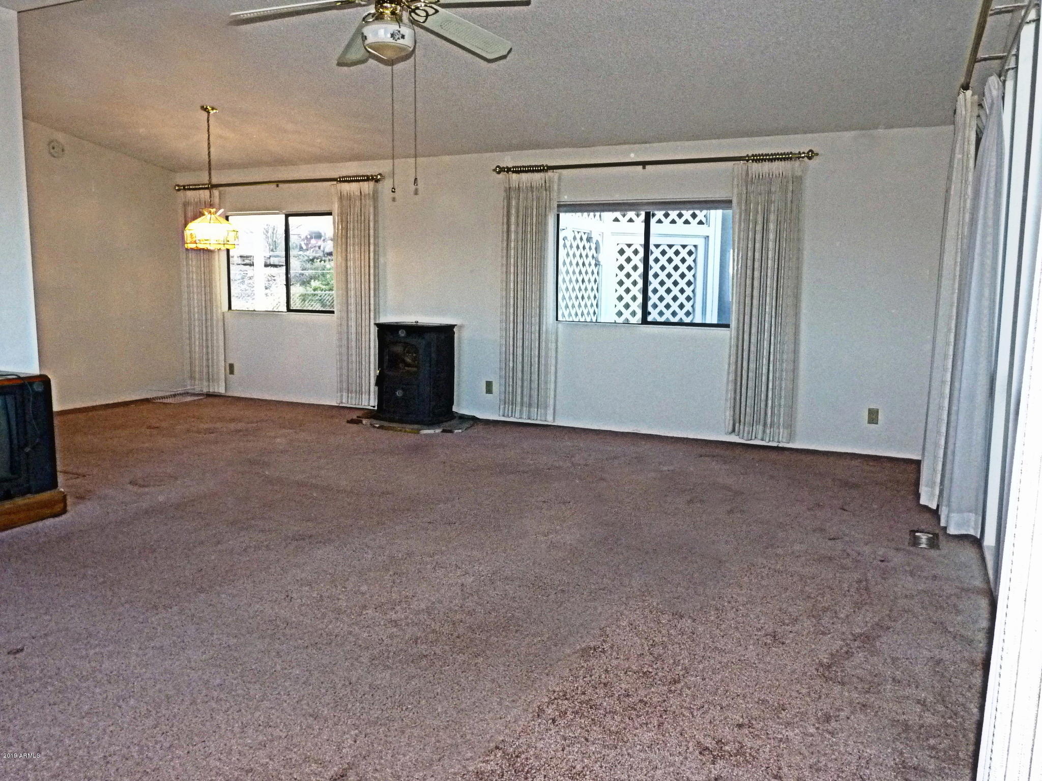 3165 Shiloh Road Prescott, AZ 86301 - Photo 3 of 36 Living Room view towards the Dining Room