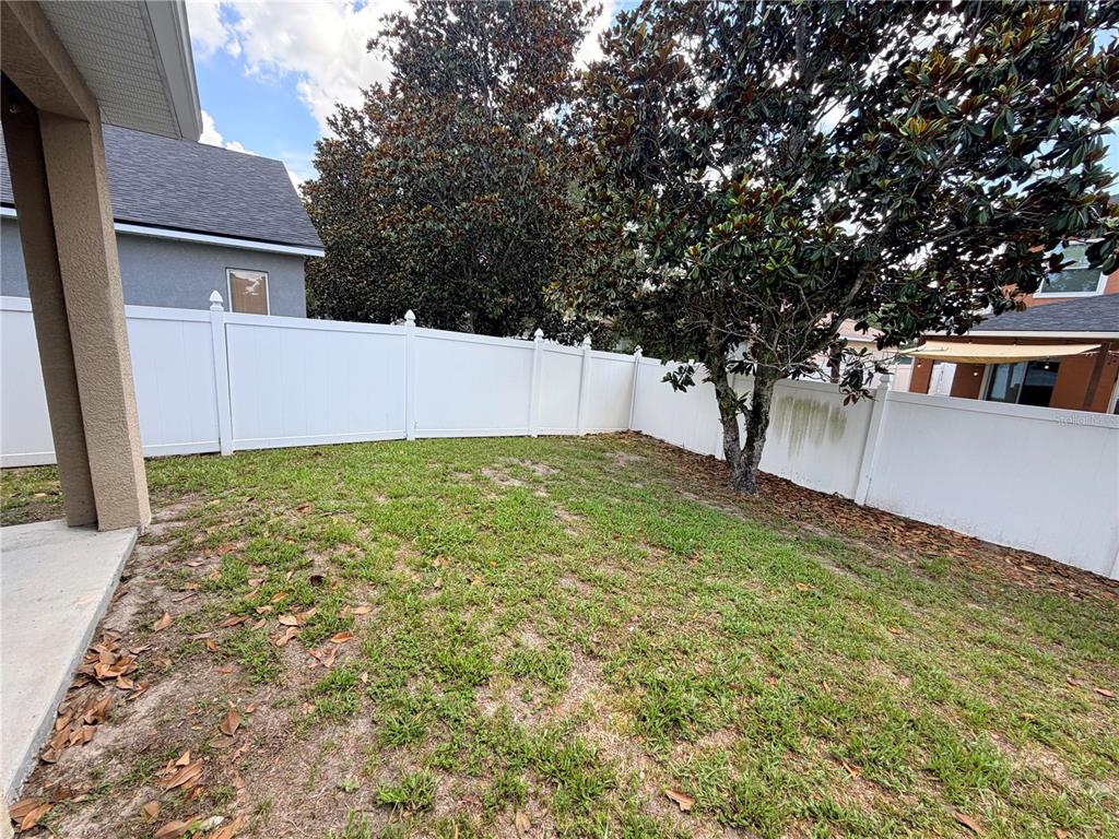 13250 Mandalay Place Spring Hill, FL 34609 - Photo 26 of 28 a view of a back yard