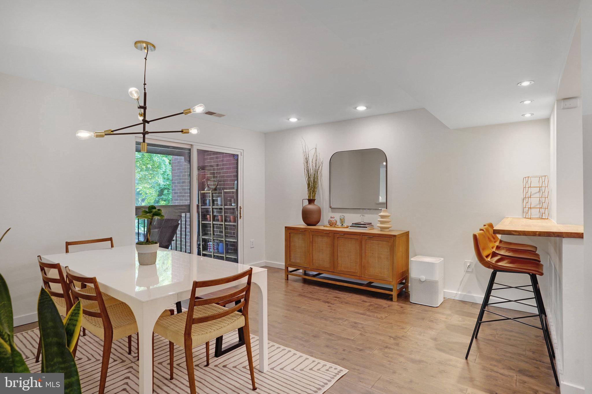 11784 Indian Ridge Road Reston, VA 20191 - Photo 10 of 44 a view of a dining room with furniture and window