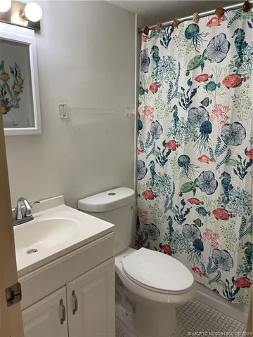 a view of a balcony with chair and table