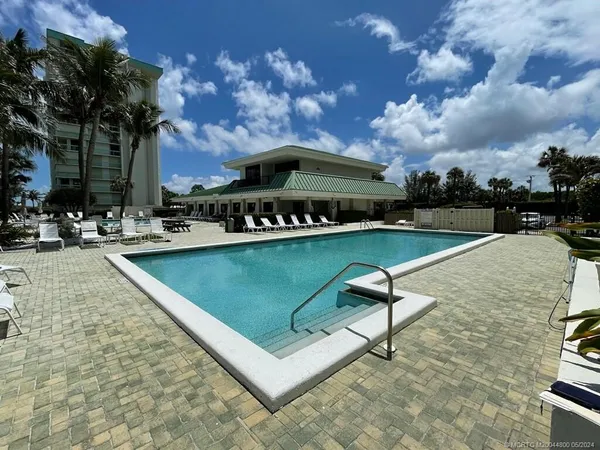 a view of a house with a swimming pool