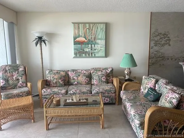 a room with furniture and a flat screen tv
