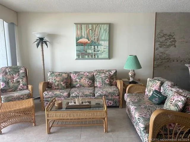 a room with furniture and a flat screen tv