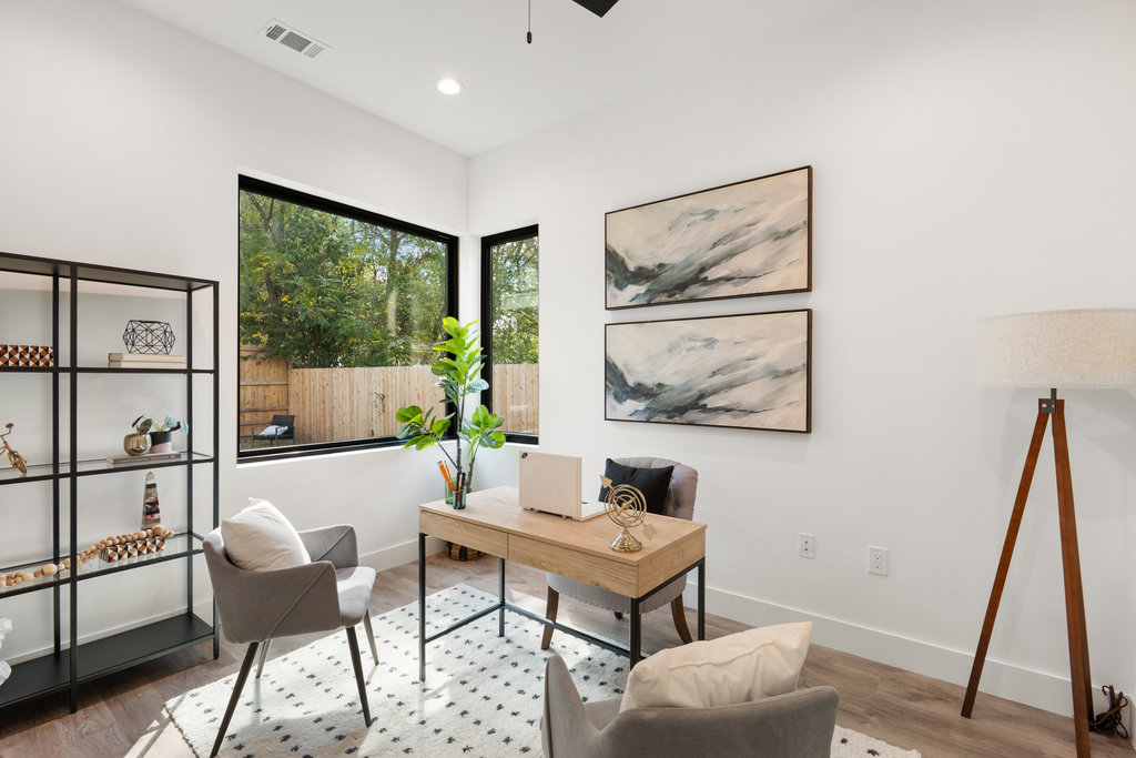 4407 Merle Drive, Unit B Austin, TX 78745 - Photo 26 of 38 a living room with furniture and a painting on the wall