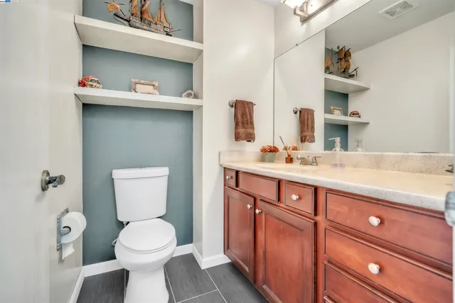 a bathroom with a sink and a toilet