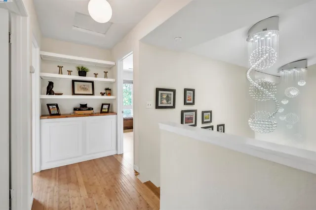 a view of kitchen with furniture and wooden floor