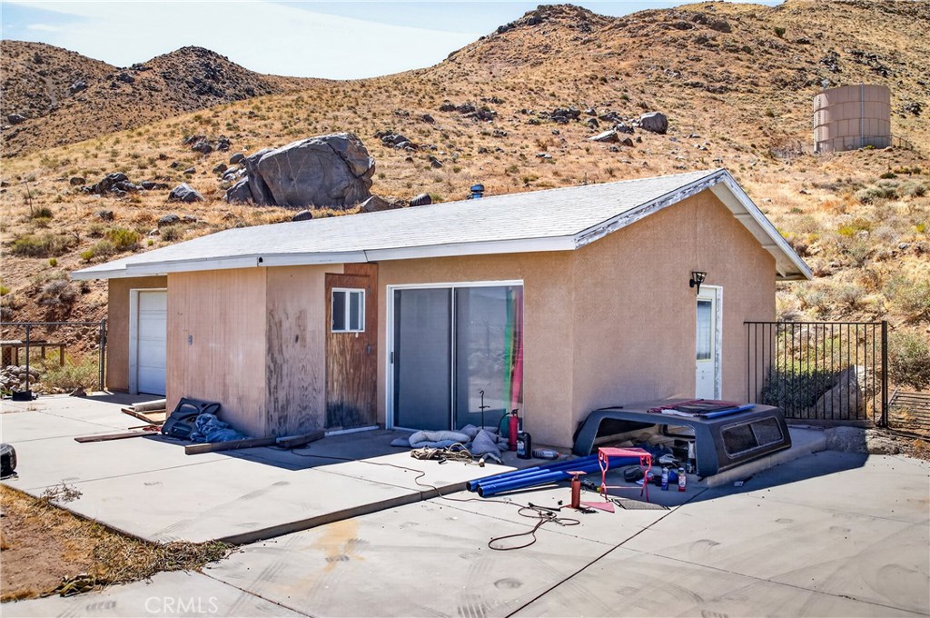 8929 Central Road Apple Valley, CA 92308 - Photo 39 of 43 Detached two car garage with workshop and bathroom.