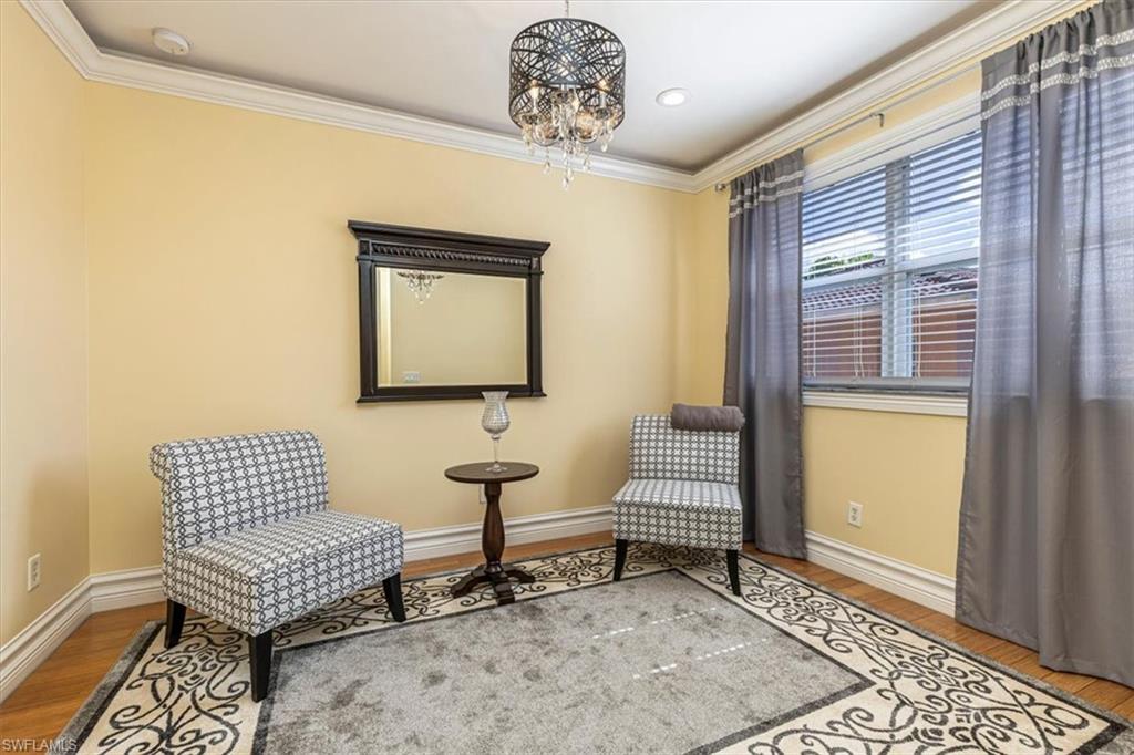 2135 Par Drive Naples, FL 34120 - Photo 19 of 49 a living room with furniture and a window