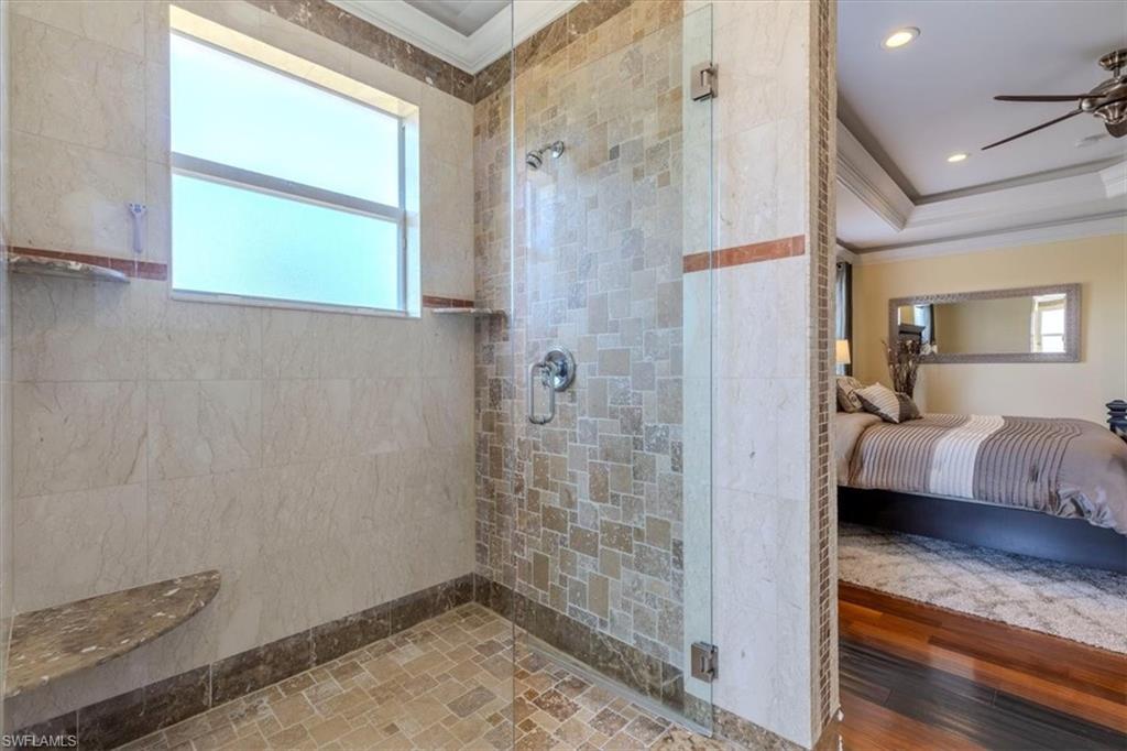 2135 Par Drive Naples, FL 34120 - Photo 20 of 49 a bathroom with a sink and a mirror