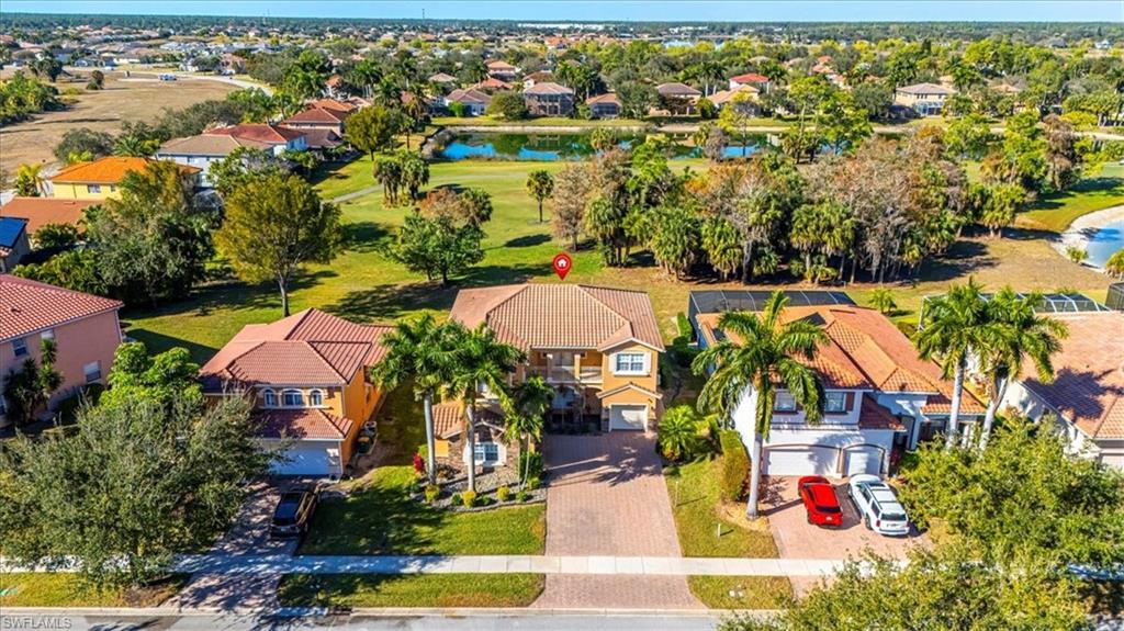2135 Par Drive Naples, FL 34120 - Photo 2 of 49 an aerial view of residential houses with outdoor space and swimming pool