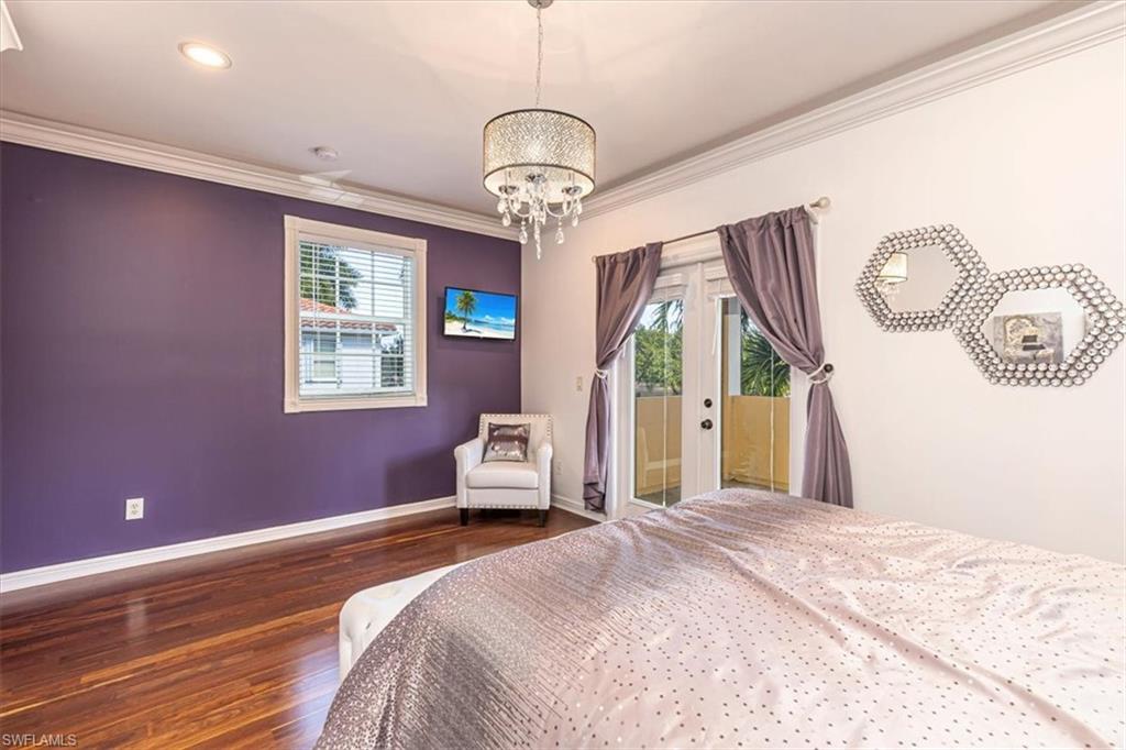 2135 Par Drive Naples, FL 34120 - Photo 36 of 49 a bedroom with a bed and a window