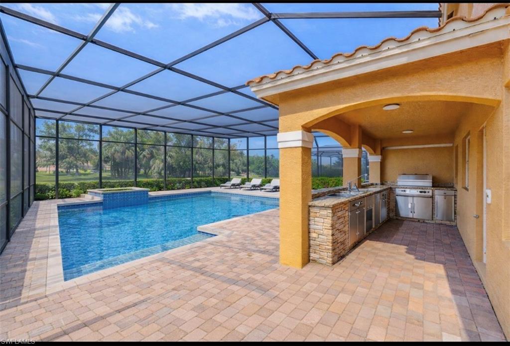 2135 Par Drive Naples, FL 34120 - Photo 48 of 49 a view of a kitchen with a sink and cabinets