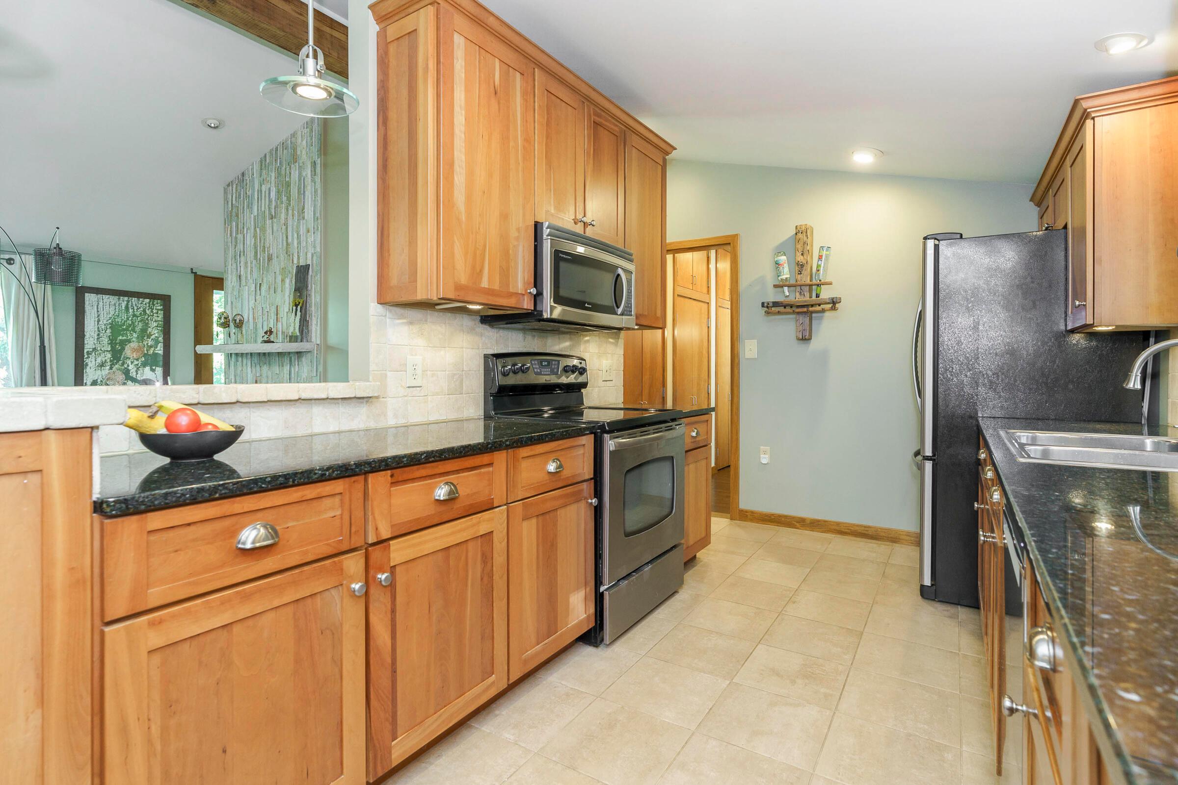4200 Dublin Road, Unit LOT 8 Columbus, OH 43221 - Photo 14 of 46 Natural Cherry Cabinets