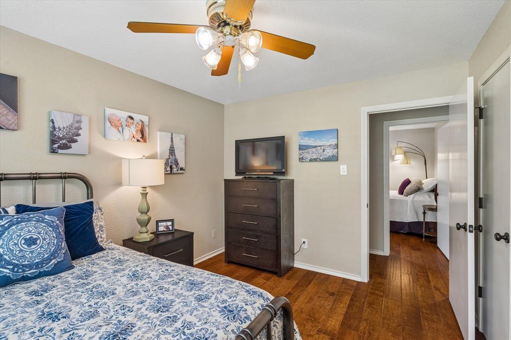 404 Moonlight Lane Keller, TX 76248 - Photo 28 of 40 a bedroom with a bed and a television