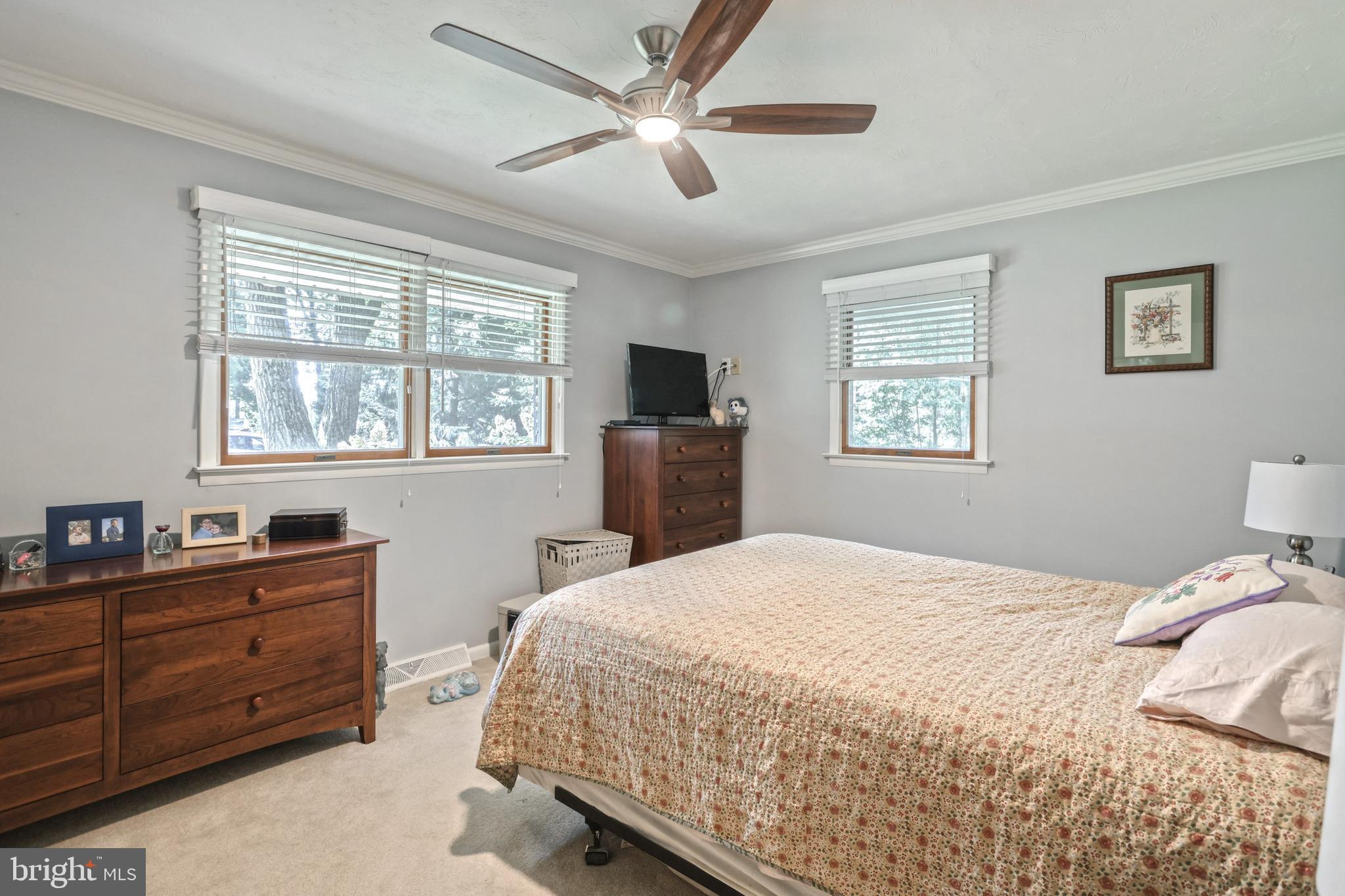 5071 Rislyn Court Spring Grove, PA 17362 - Photo 14 of 29 a bedroom with a bed and a dresser next to a window