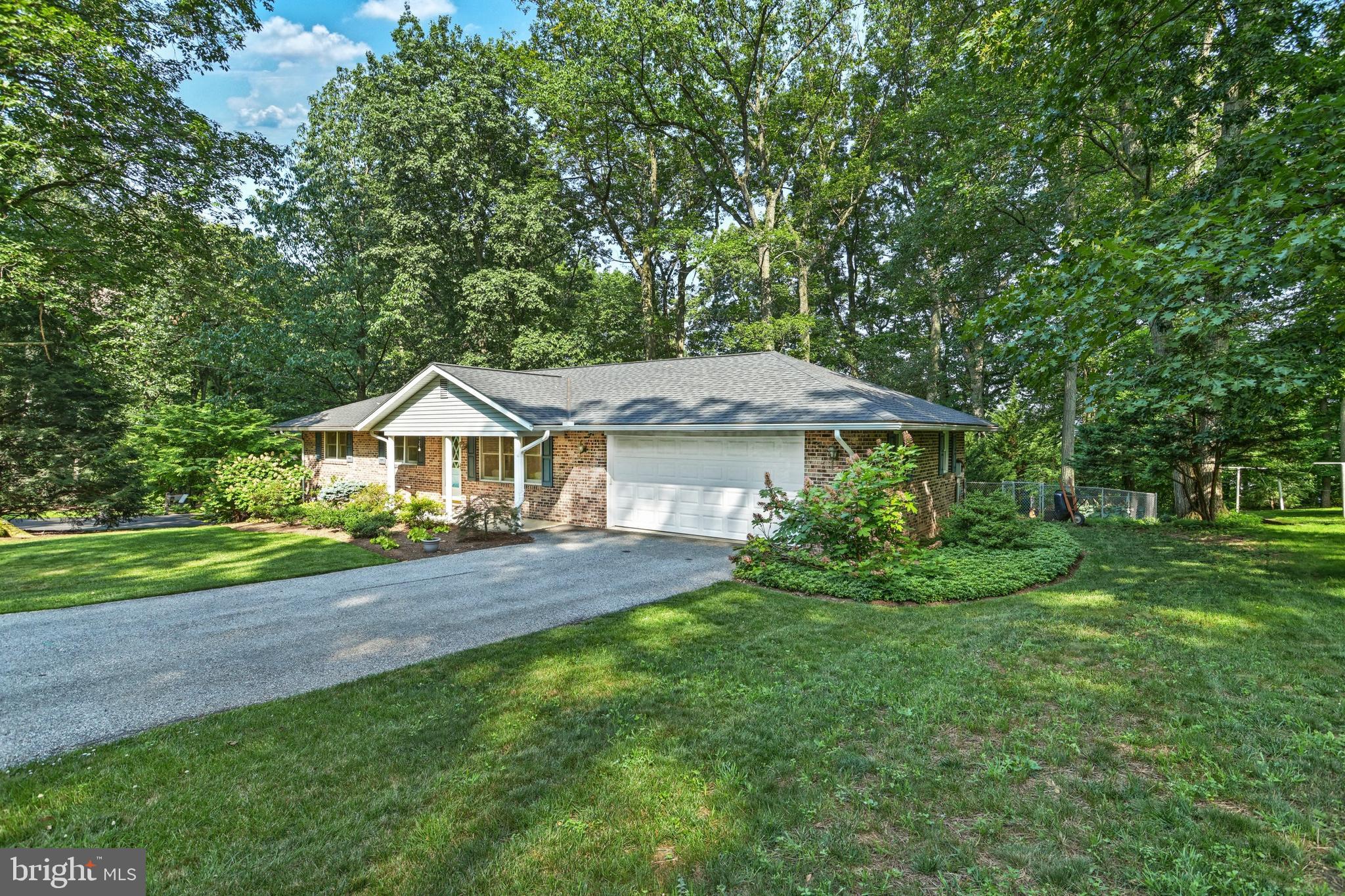 5071 Rislyn Court Spring Grove, PA 17362 - Photo 3 of 29 a front view of a house with a yard