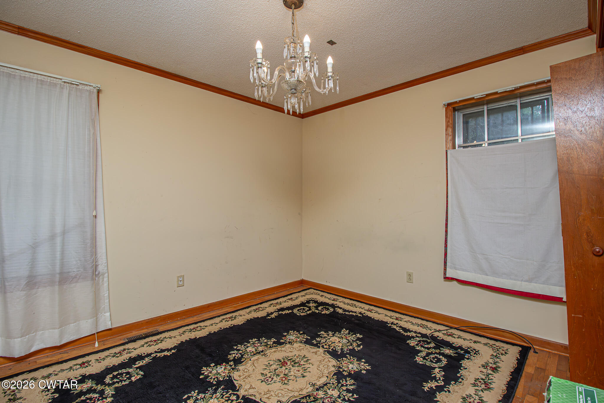 11 North Main Street Stanton, TN 38069 - Photo 11 of 18 a view of a hallway with a chandelier