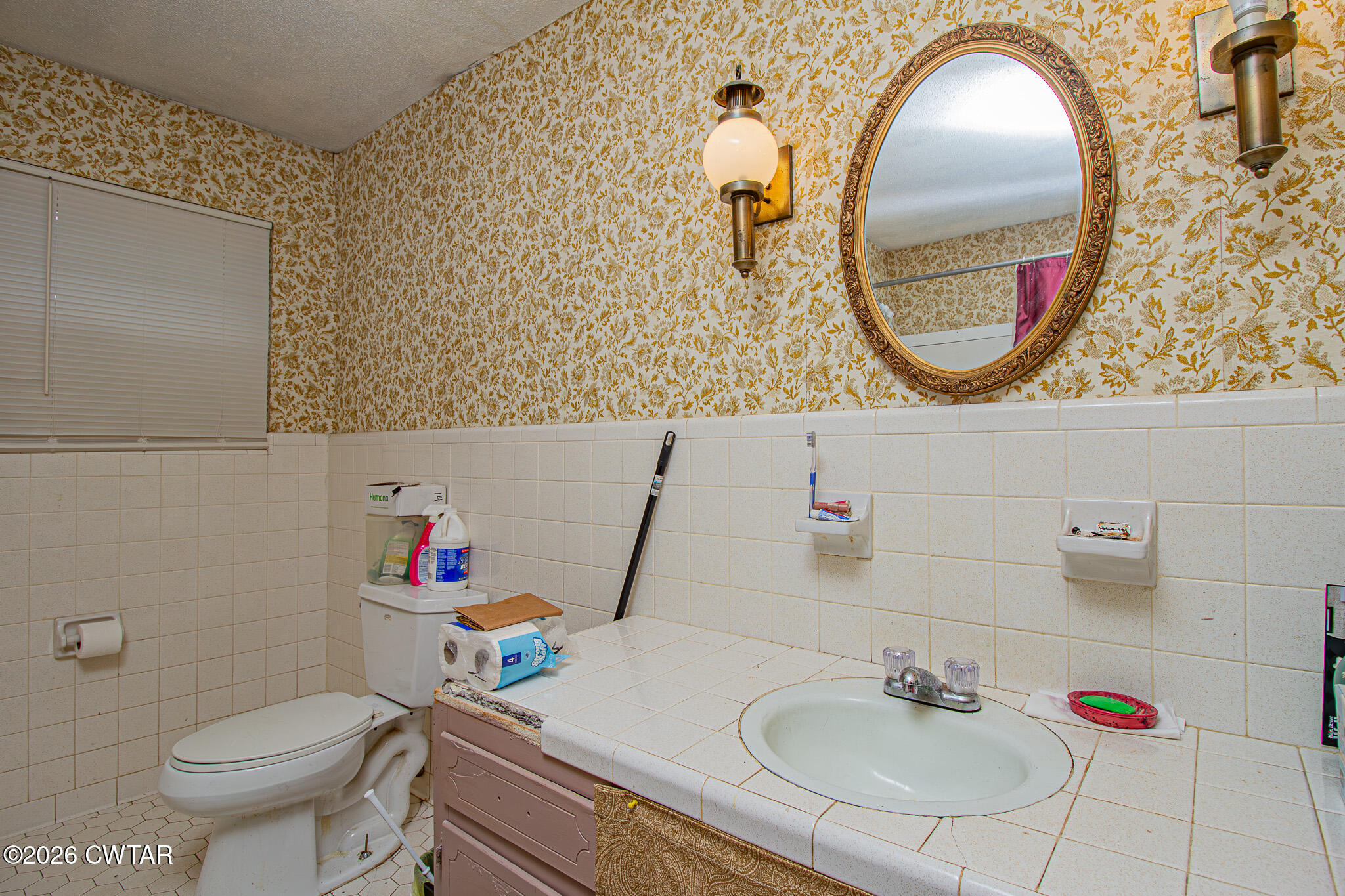 11 North Main Street Stanton, TN 38069 - Photo 13 of 18 a bathroom with a sink and a mirror