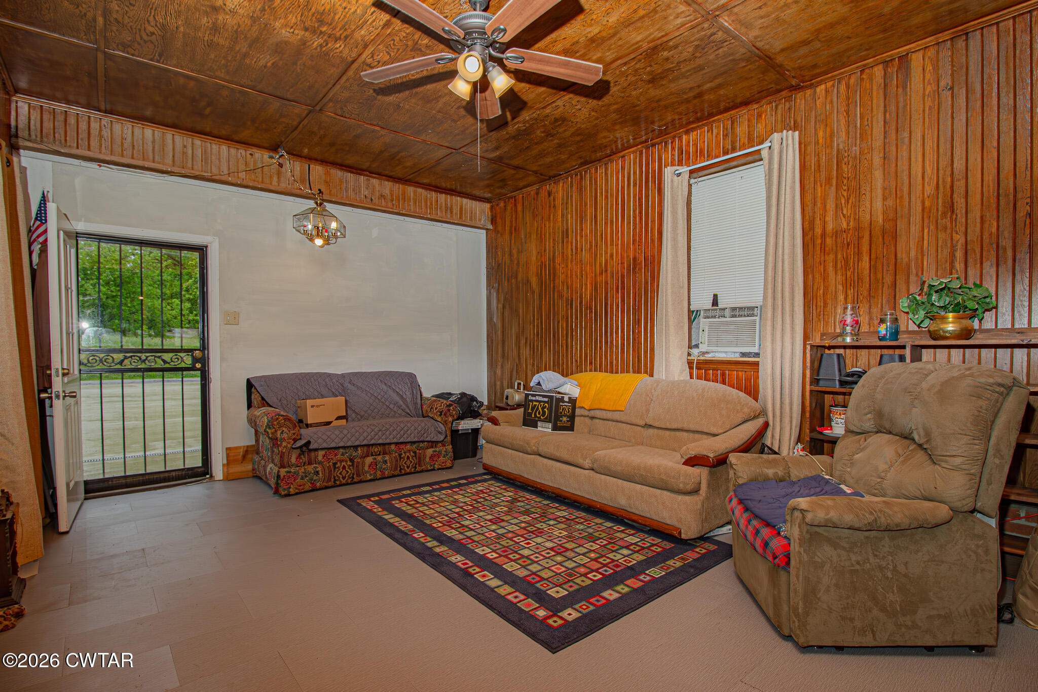 11 North Main Street Stanton, TN 38069 - Photo 2 of 18 a living room with furniture and a window