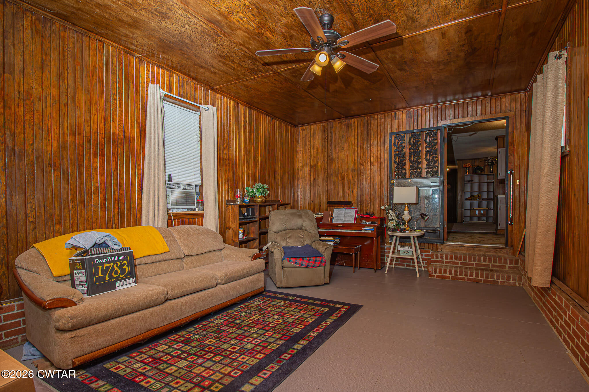 11 North Main Street Stanton, TN 38069 - Photo 3 of 18 a living room with furniture and a window