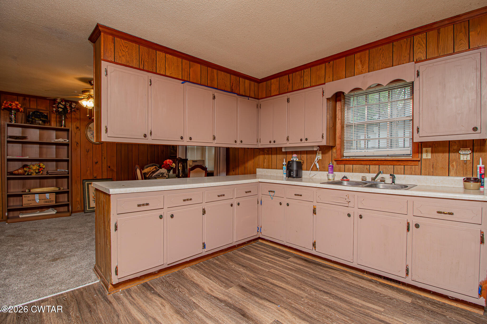 11 North Main Street Stanton, TN 38069 - Photo 5 of 18 a kitchen with granite countertop white cabinets and sink