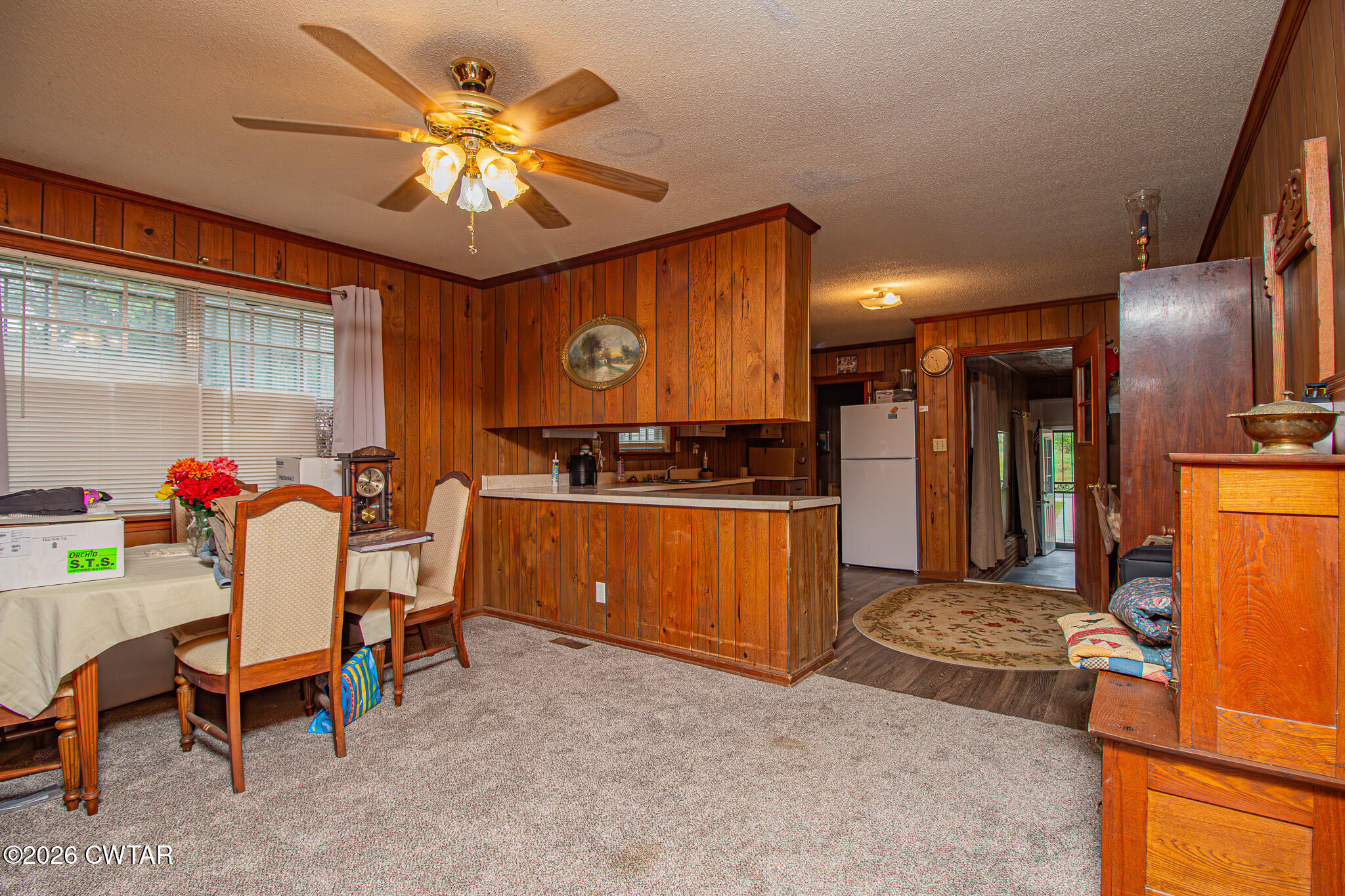 11 North Main Street Stanton, TN 38069 - Photo 6 of 18 a view of kitchen with furniture and a chandelier