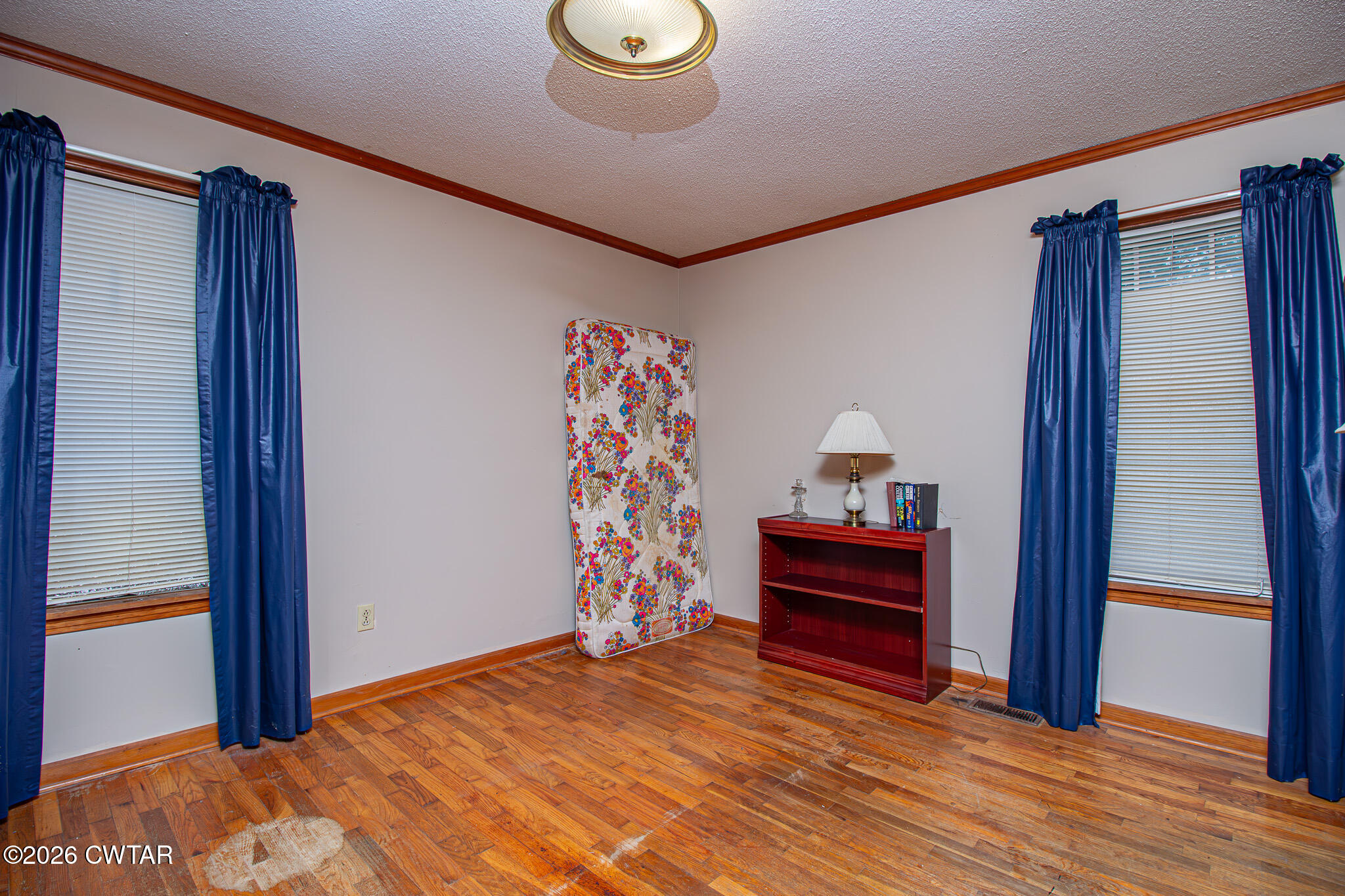 11 North Main Street Stanton, TN 38069 - Photo 10 of 18 a bedroom with a bed and a window