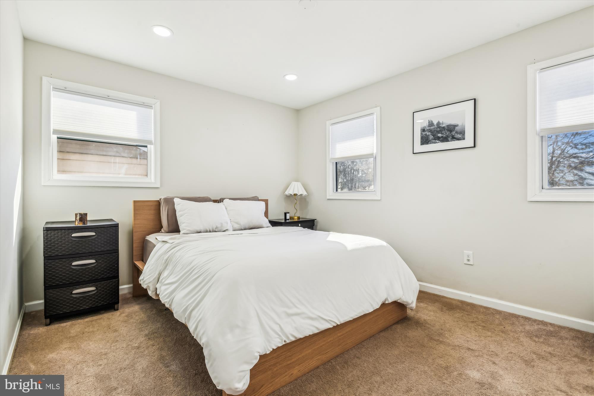 232 Candytuft Road Reisterstown, MD 21136 - Photo 12 of 42 a bedroom with a bed and a lamp