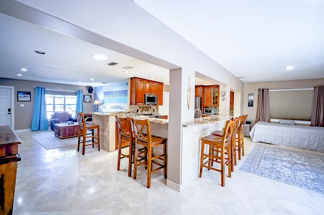 a view of dining room and hall with furniture