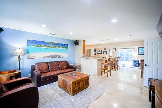 a bedroom with furniture and a table