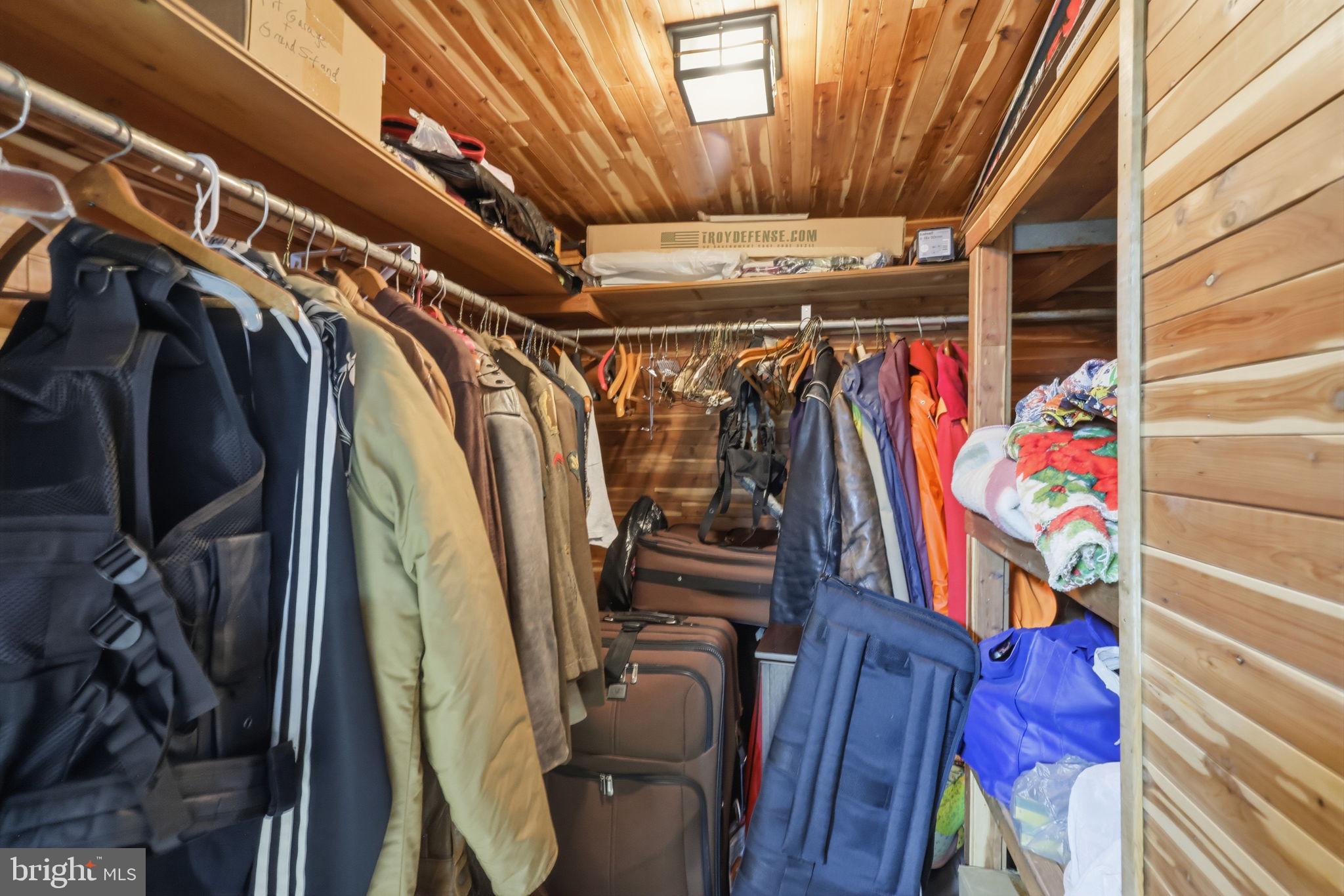 1413 Poplar Road Feasterville-Trevose, PA 19053 - Photo 26 of 35 a view of walk in closet with clothes