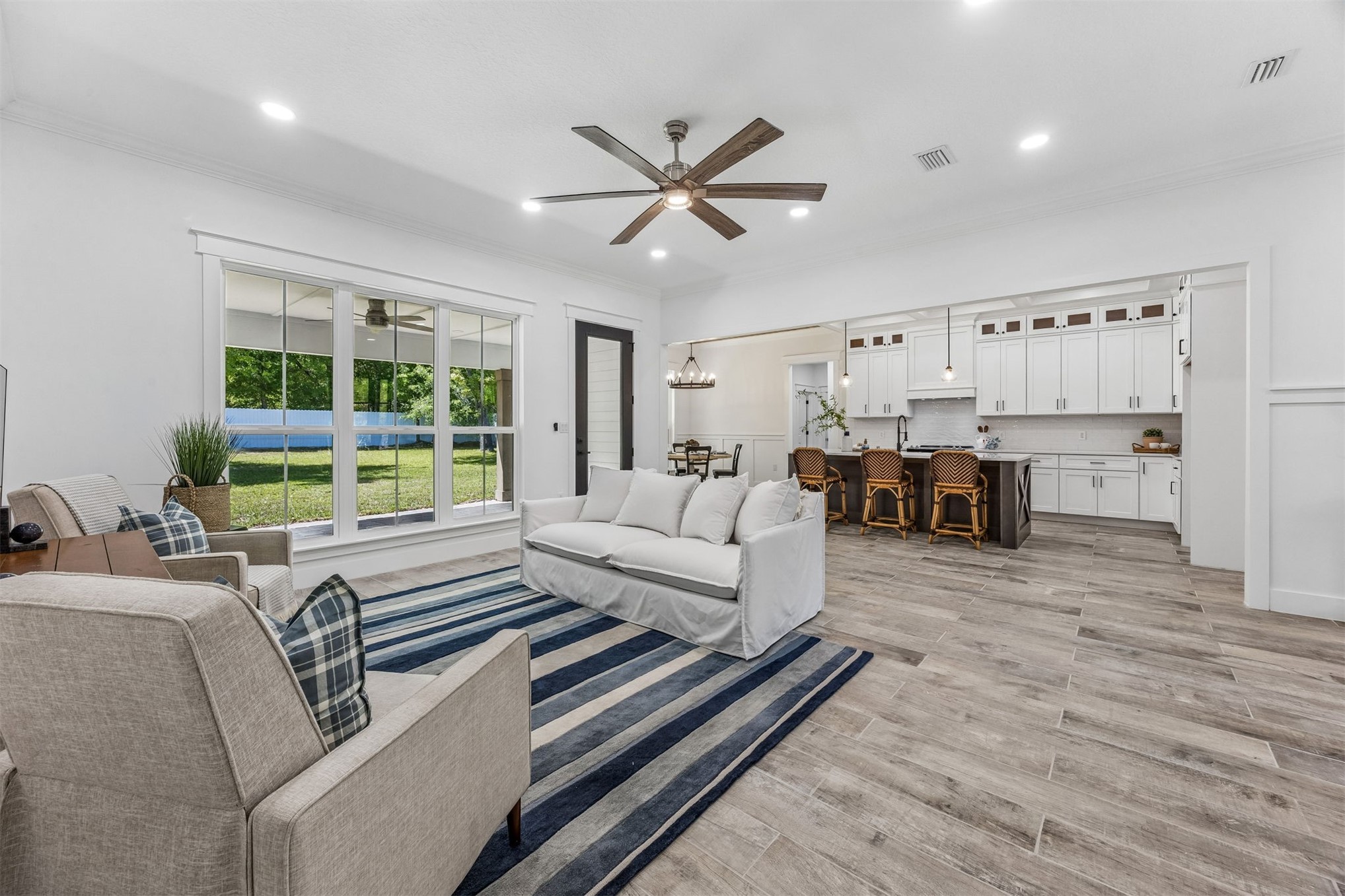 95121 North Ellis Landing Road Fernandina Beach, FL 32034 - Photo 13 of 37 a living room with furniture and a large window