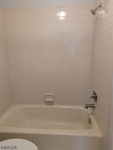 a close up of a bathtub in a bathroom