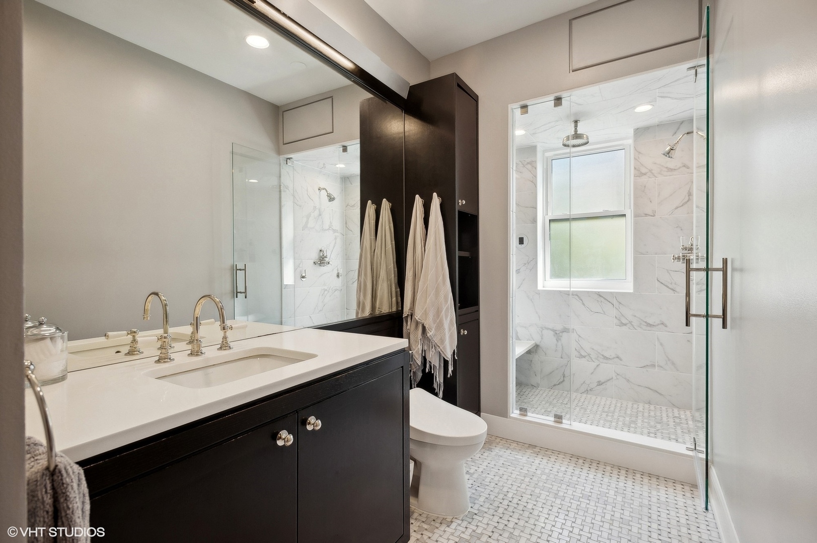 400 West Briar Place, Unit 3C Chicago, IL 60657 - Photo 13 of 21 a bathroom with a sink a toilet and shower