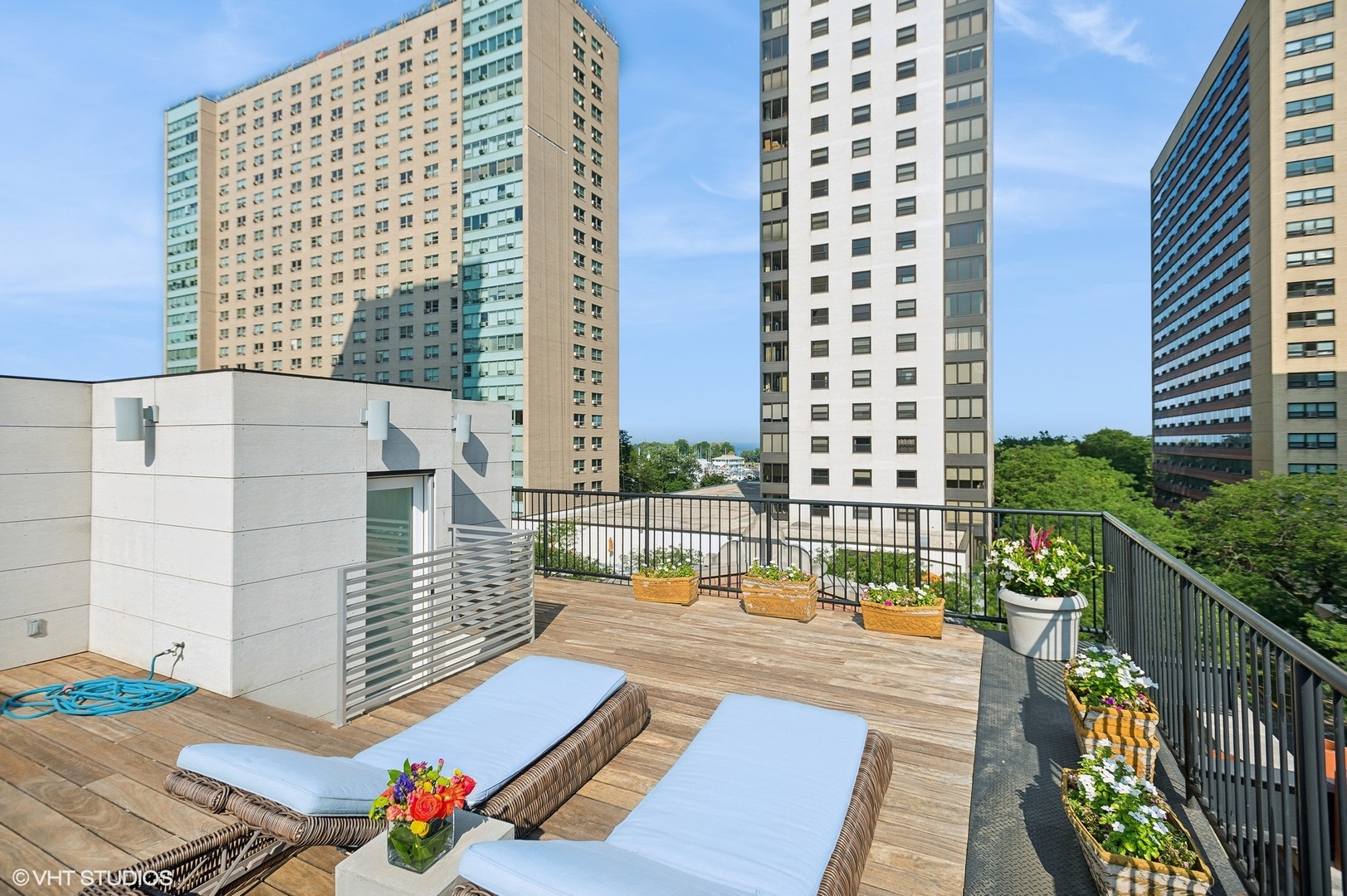 400 West Briar Place, Unit 3C Chicago, IL 60657 - Photo 19 of 21 a view of balcony with wooden floor