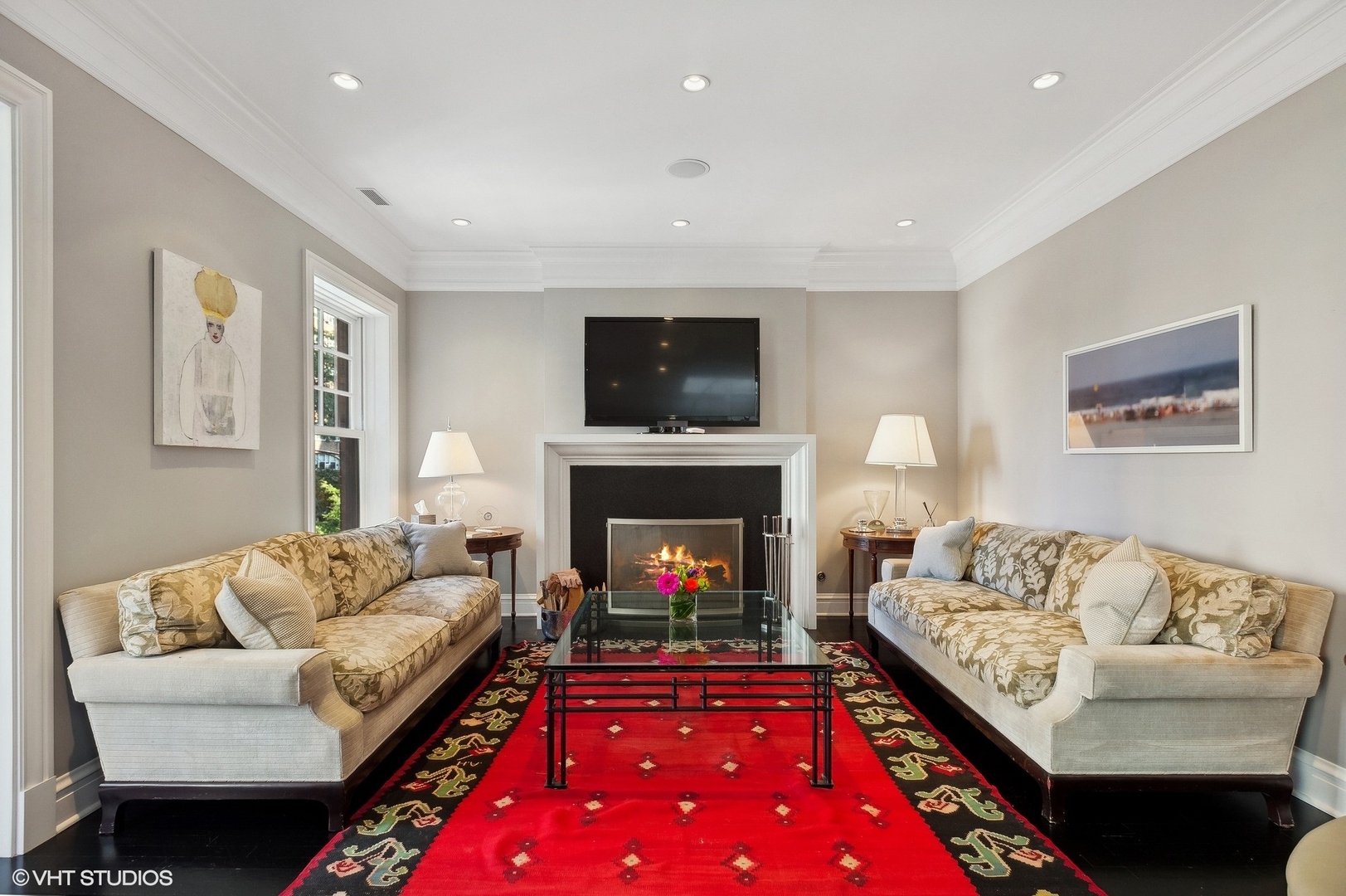 400 West Briar Place, Unit 3C Chicago, IL 60657 - Photo 3 of 21 a living room with furniture a flat screen tv and a fireplace