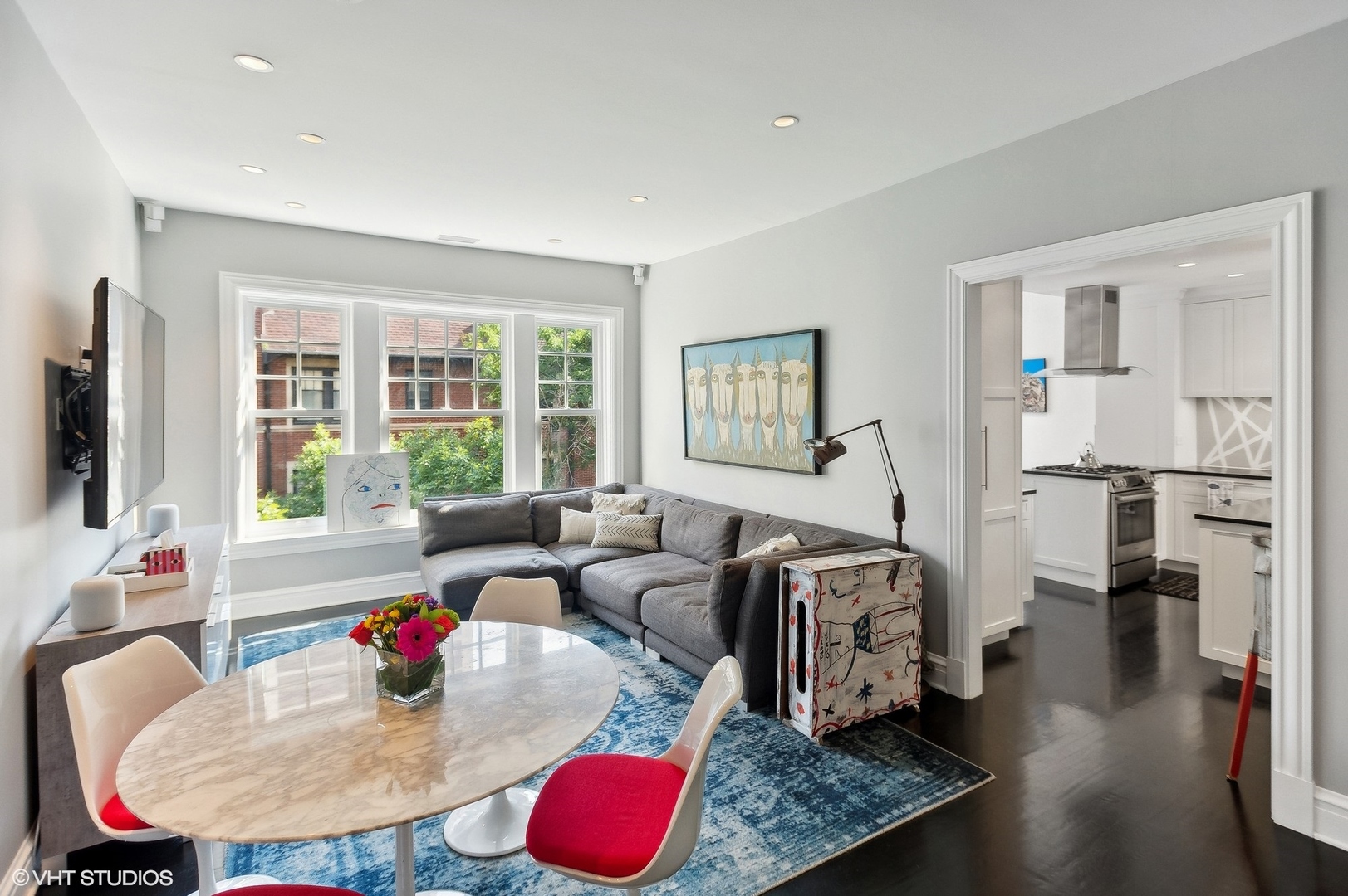 400 West Briar Place, Unit 3C Chicago, IL 60657 - Photo 6 of 21 a living room with furniture and a flat screen tv