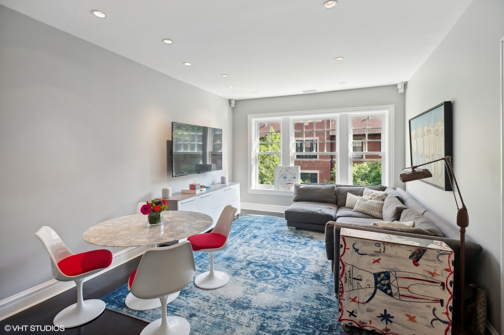 400 West Briar Place, Unit 3C Chicago, IL 60657 - Photo 7 of 21 a living room with furniture and a flat screen tv