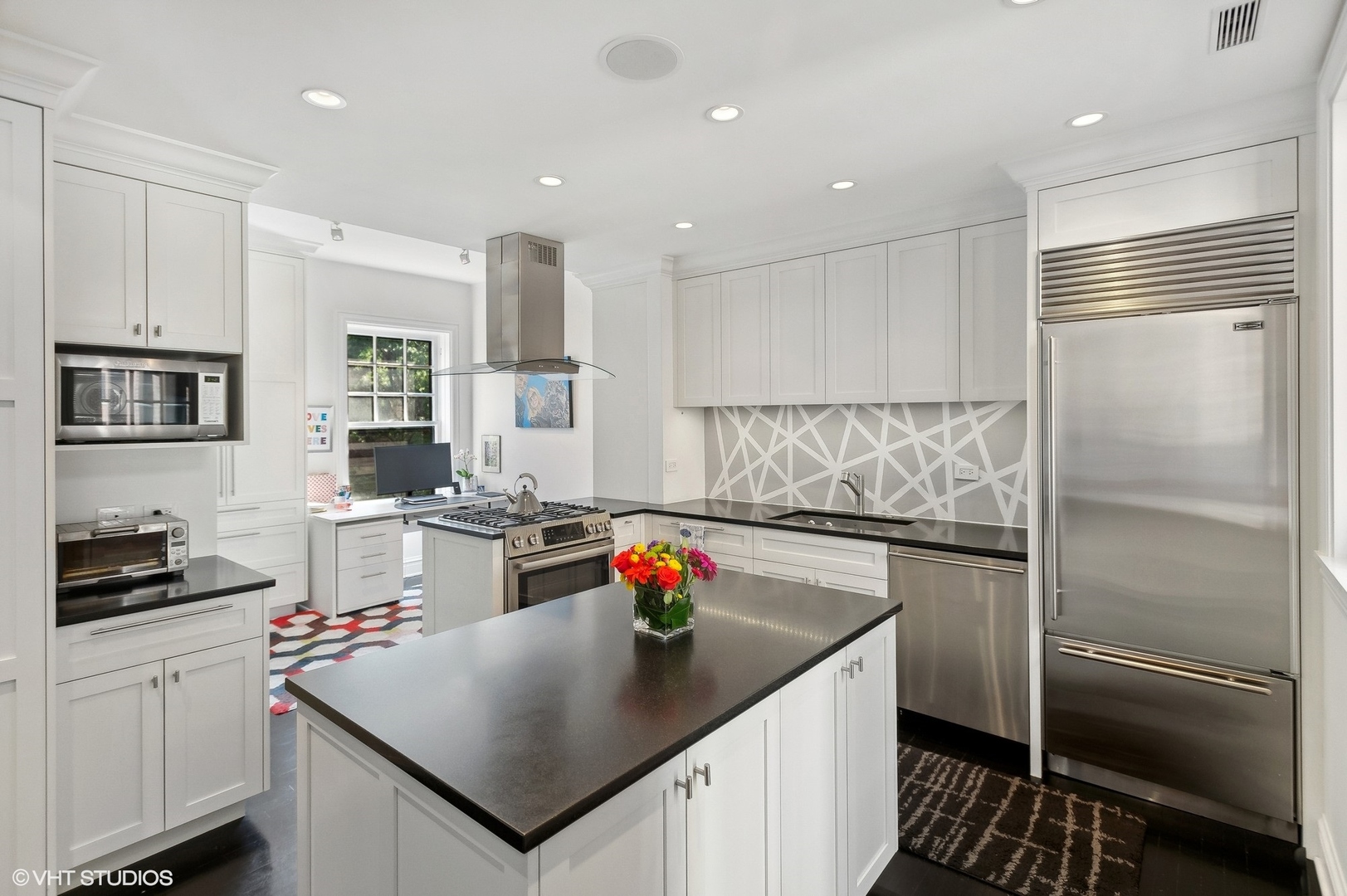 400 West Briar Place, Unit 3C Chicago, IL 60657 - Photo 9 of 21 a kitchen with a refrigerator sink and microwave