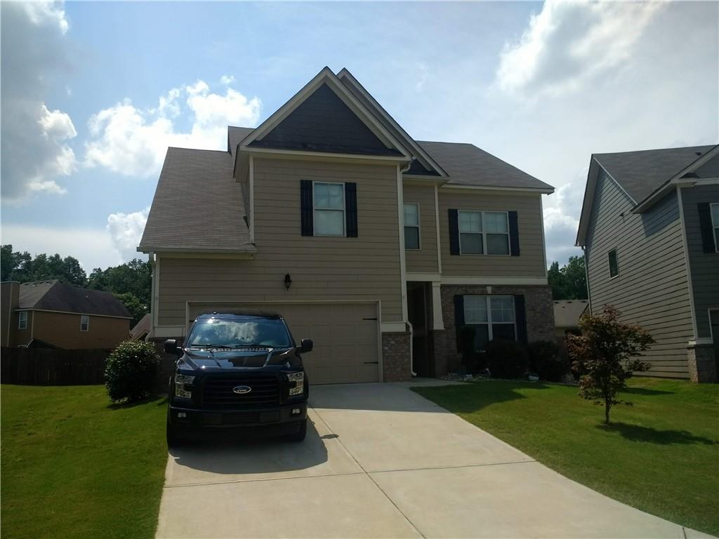 Come see this large and bright home. Fantastic floor plan. Great amenities. Fenced backyard. Just minutes from Ga 400, North Georgia Premium Outlets, Lake Lanier, a new Walmart and dining. 