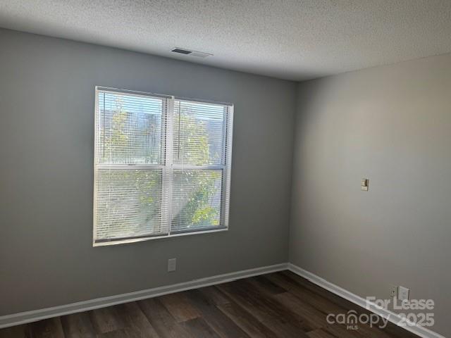 308 Hoskins Mill Lane, Unit H Charlotte, NC 28208 - Photo 8 of 12 an empty room with a window