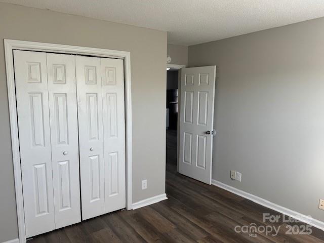 308 Hoskins Mill Lane, Unit H Charlotte, NC 28208 - Photo 10 of 12 a view of an empty room with wooden floor