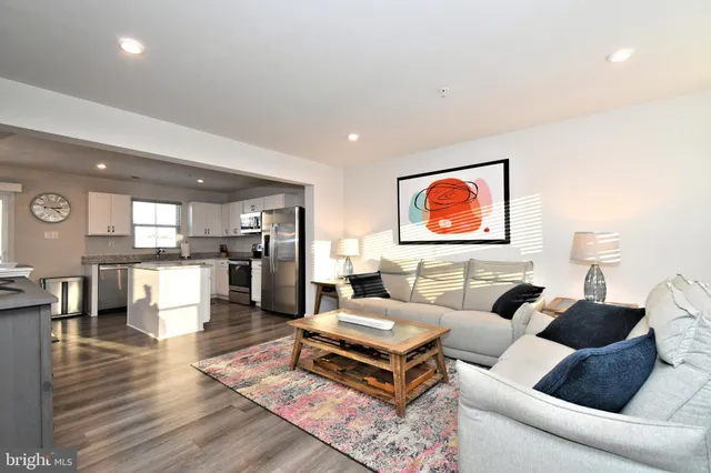 a front view of a building with retail shops