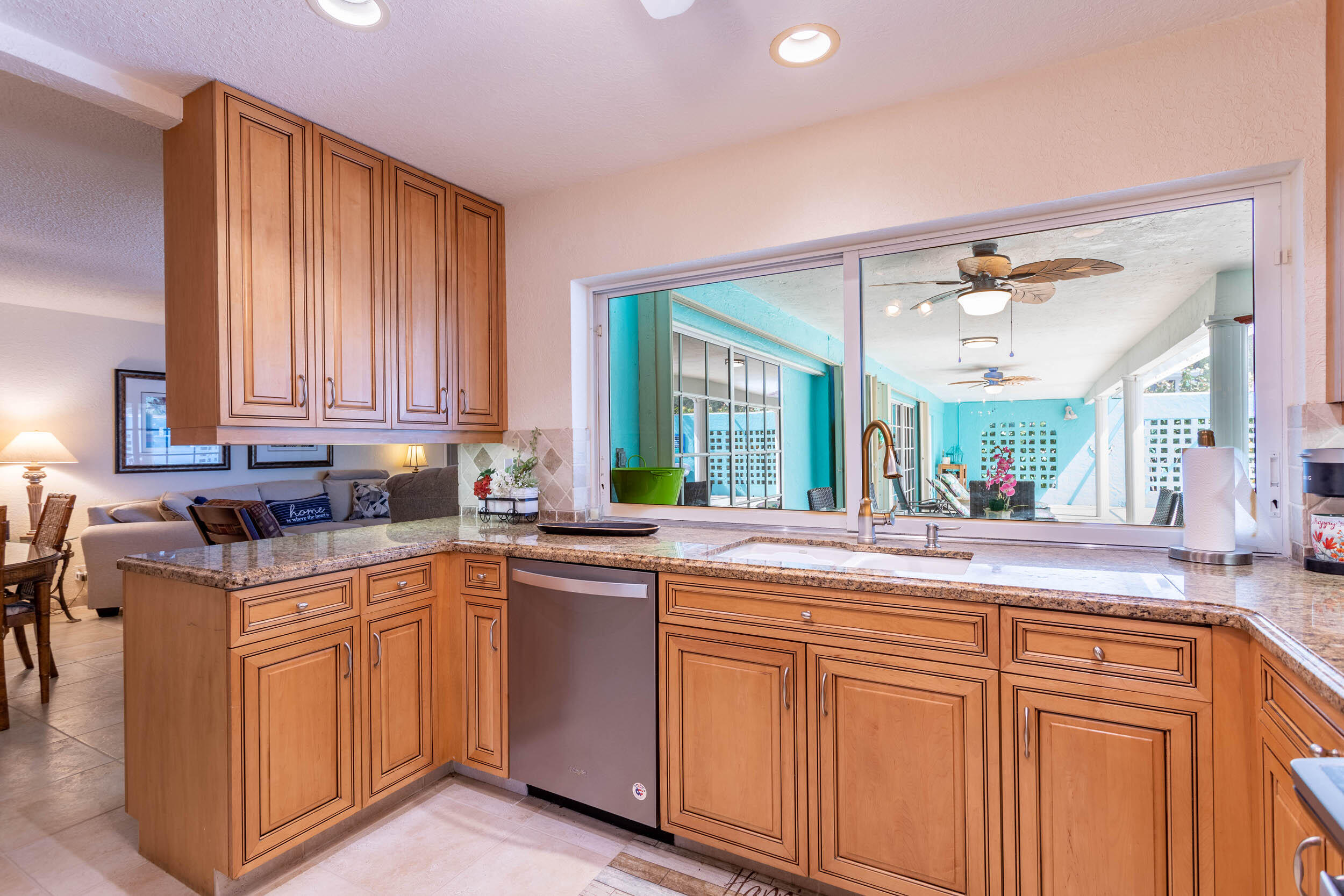 911 Southwest 17th Street Boca Raton, FL 33486 - Photo 17 of 44 Kitchen overlooking pool deck