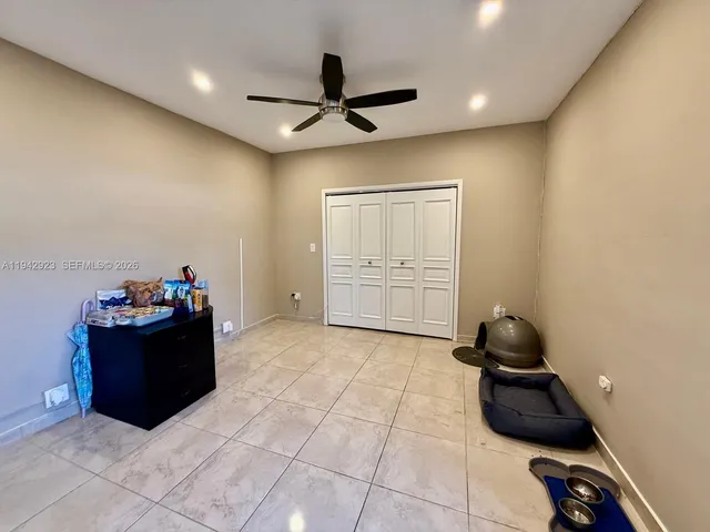 a room with furniture and a window