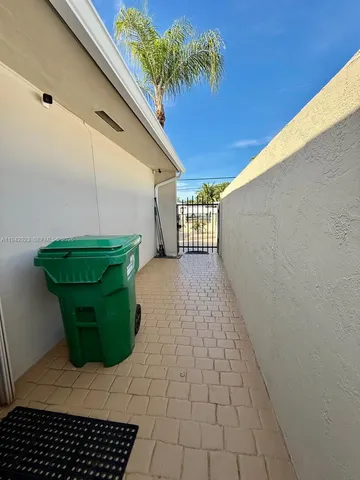 a view of a backyard with plants