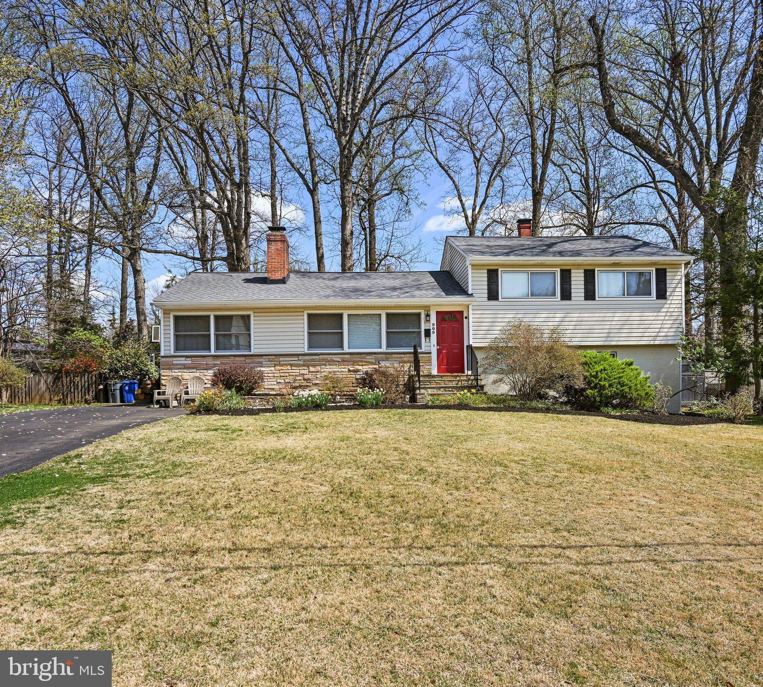 909 Plum Street Southwest Vienna, VA 22180 - Photo 1 of 38 front view of a house with a yard