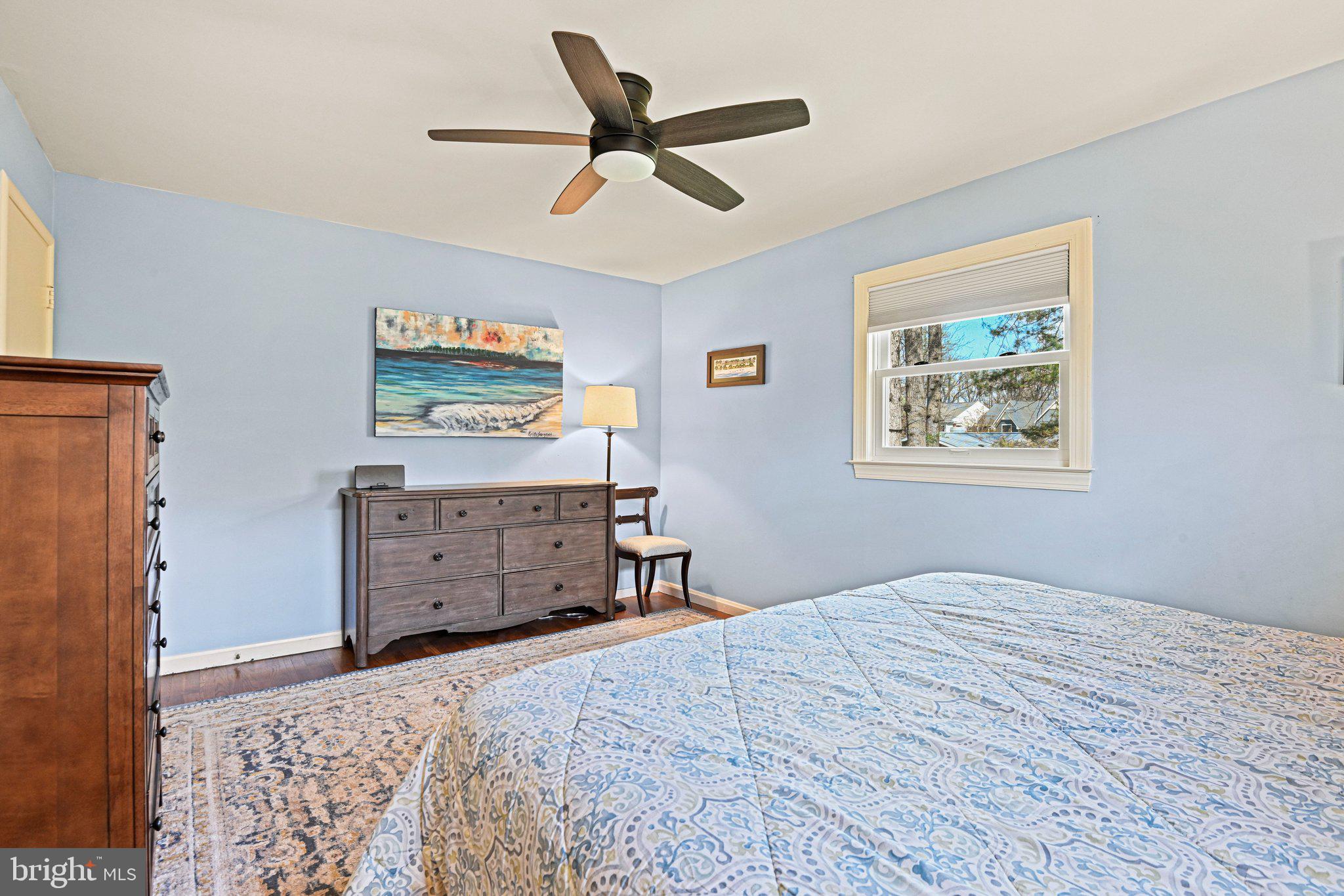 909 Plum Street Southwest Vienna, VA 22180 - Photo 16 of 38 a bedroom with a bed and a dresser in it